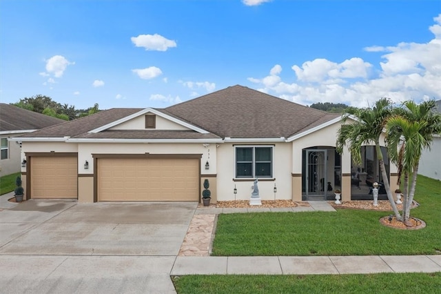 ranch-style home with a garage and a front lawn