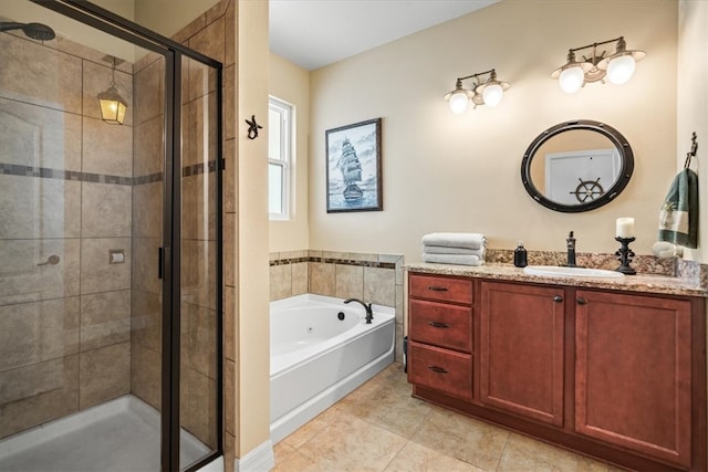 bathroom featuring tile patterned flooring, vanity, and plus walk in shower