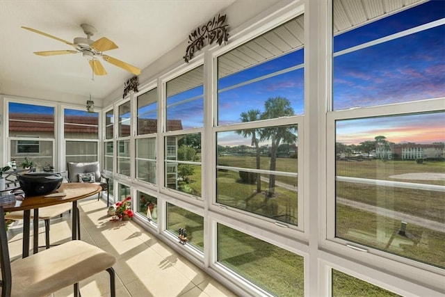 sunroom / solarium with ceiling fan