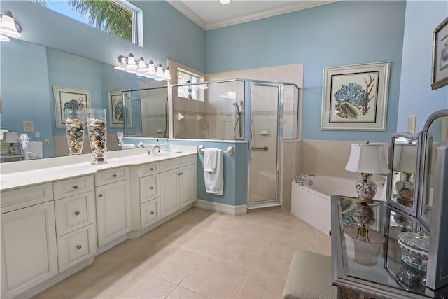 bathroom featuring tile patterned flooring, a garden tub, a sink, ornamental molding, and a shower stall