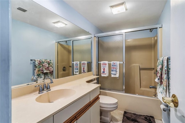 5 Plantation Dr Unit 206, Vero Beach, FL 32966 - bathroom with vanity, combined bath / shower with glass door, and tile patterned floors