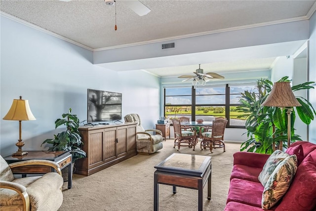 5 Plantation Dr Unit 206, Vero Beach, FL 32966 - living area with a ceiling fan, light colored carpet, crown molding, and a textured ceiling