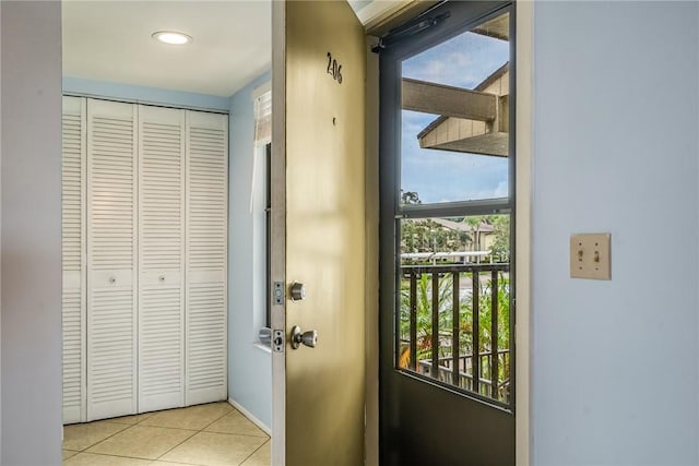 5 Plantation Dr Unit 206, Vero Beach, FL 32966 - entryway featuring tile patterned floors and baseboards
