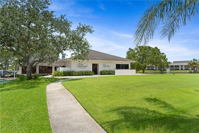 5 Plantation Dr Unit 206, Vero Beach, FL 32966 - ranch-style home with a front lawn and stucco siding