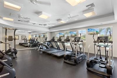 5582 49th Ave, Vero Beach, FL 32967 - workout area with healthy amount of natural light and a raised ceiling