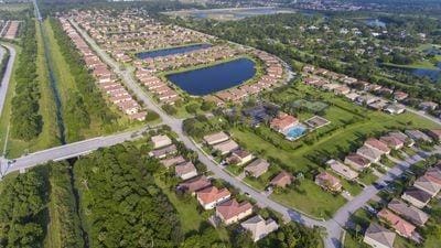 5582 49th Ave, Vero Beach, FL 32967 - aerial view of property's location with a nearby body of water and nearby suburban area