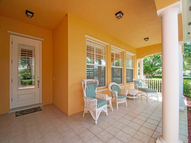 view of patio featuring covered porch