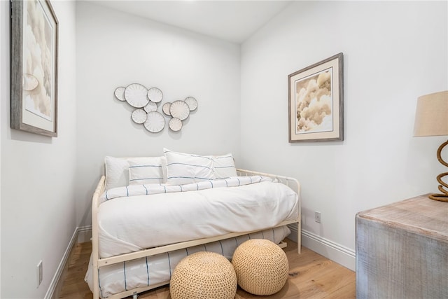 bedroom featuring hardwood / wood-style floors