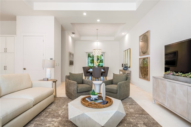 living room with a raised ceiling