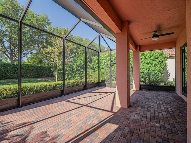 view of patio / terrace with a lanai