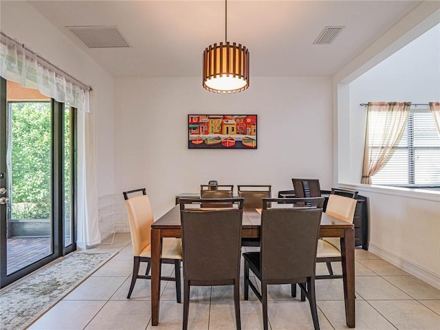 view of tiled dining space