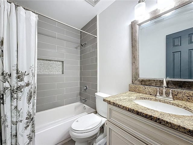 full bath featuring vanity, toilet, visible vents, and shower / bath combo