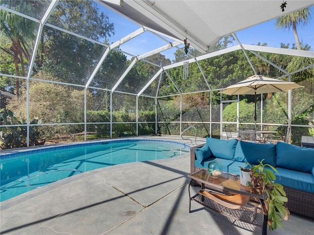 view of swimming pool with a lanai, an outdoor hangout area, and a patio