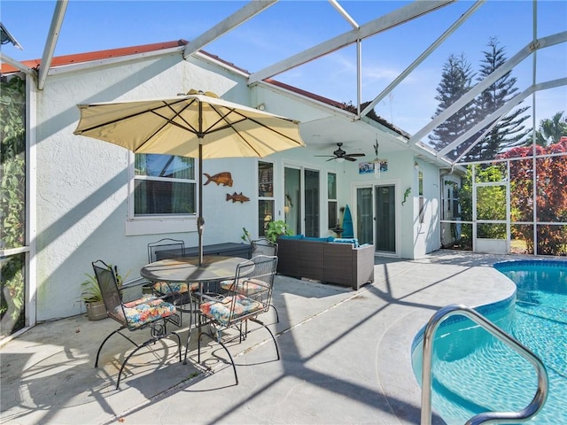 exterior space with a patio, ceiling fan, and a lanai