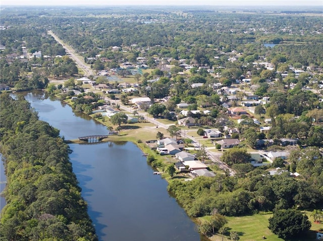 bird's eye view featuring a water view and a residential view