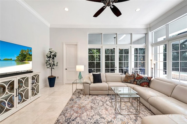 living room featuring crown molding and ceiling fan