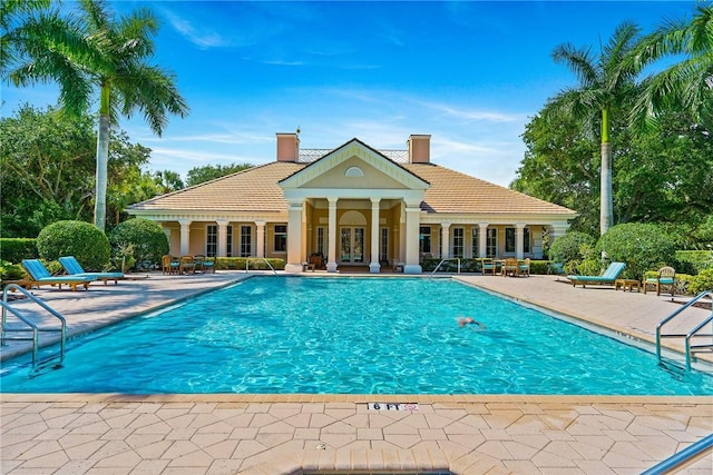 view of swimming pool with a patio