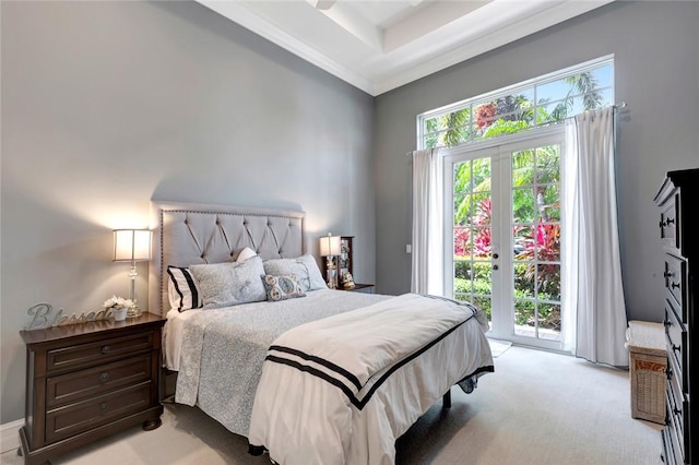 bedroom with light carpet, access to outside, and french doors