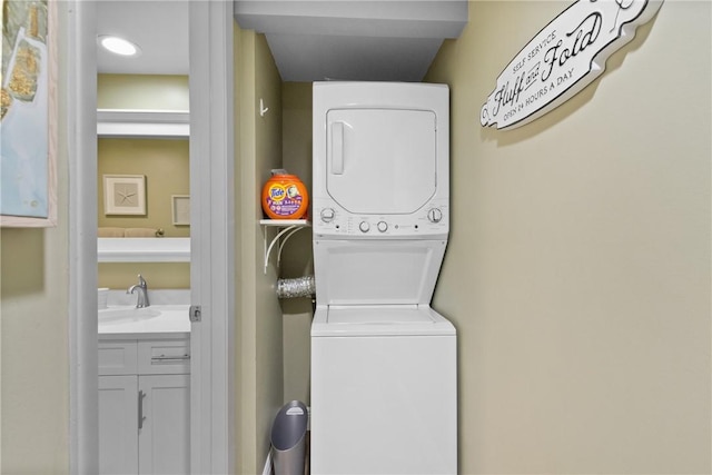 31 Plantation Dr Unit 205, Vero Beach, FL 32966 - laundry area featuring stacked washer and clothes dryer
