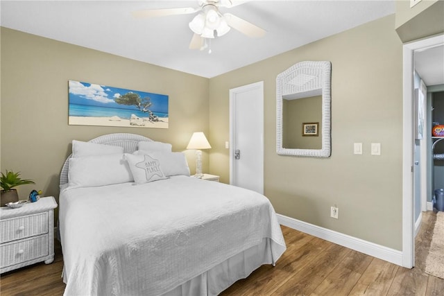 31 Plantation Dr Unit 205, Vero Beach, FL 32966 - bedroom featuring ceiling fan, baseboards, and wood finished floors