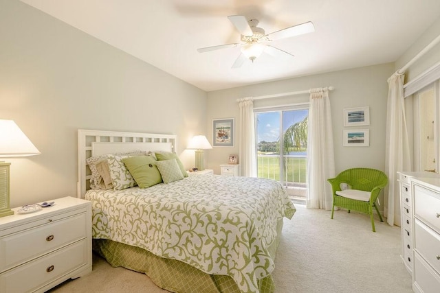 bedroom featuring ceiling fan and light colored carpet