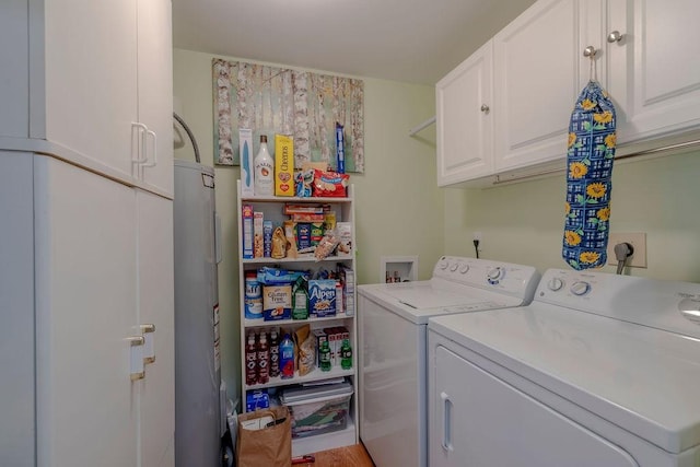 laundry area with cabinet space and washer and dryer