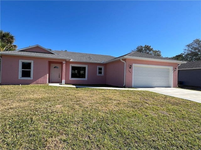 single story home featuring a garage and a front yard