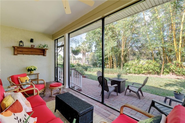 sunroom / solarium with ceiling fan