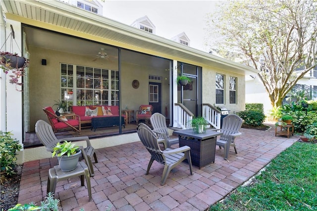 view of patio featuring outdoor lounge area and ceiling fan