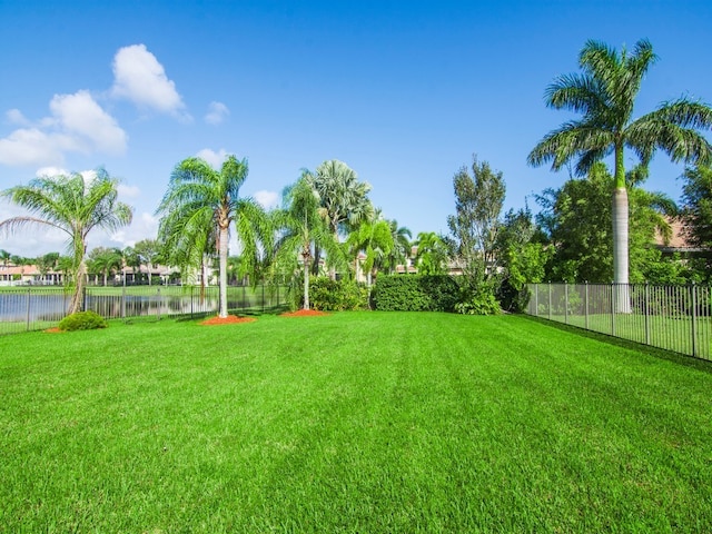 view of yard with a water view