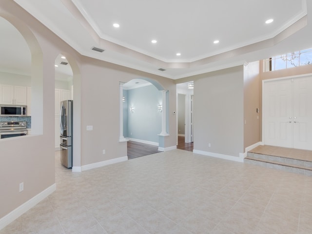 interior space with crown molding