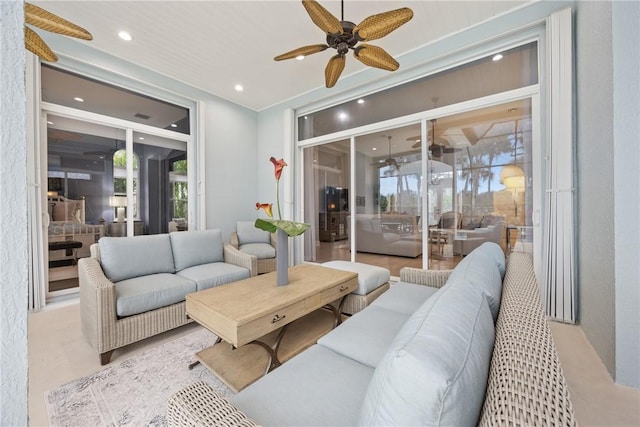 living room featuring ceiling fan