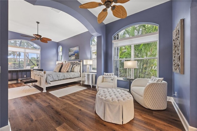 bedroom featuring ceiling fan and dark hardwood / wood-style floors