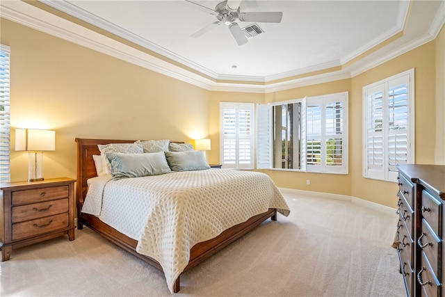 bedroom with ceiling fan, light carpet, and crown molding