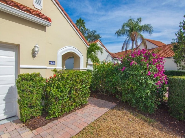 entrance to property featuring a garage