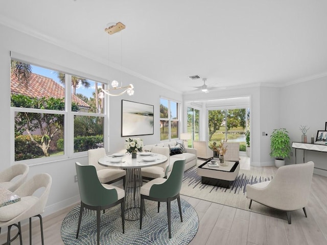 sunroom featuring a notable chandelier