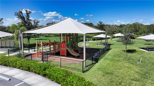 view of playground featuring a lawn