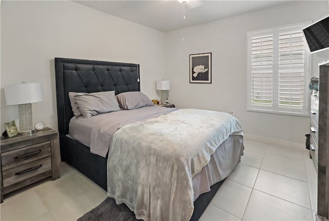 bedroom with light tile patterned flooring