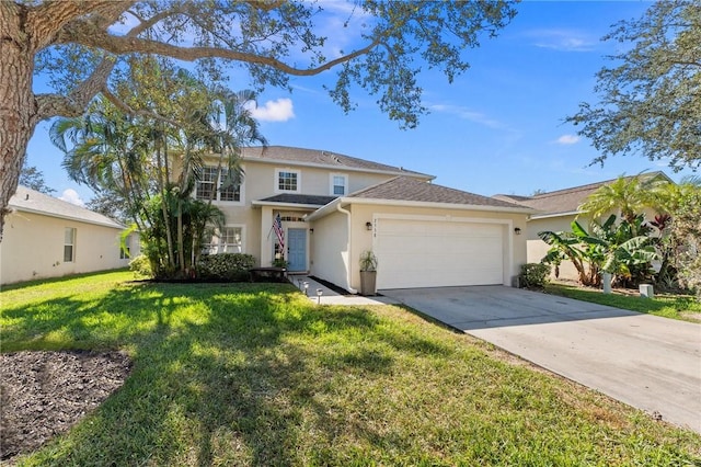 view of front of property with a garage and a front yard