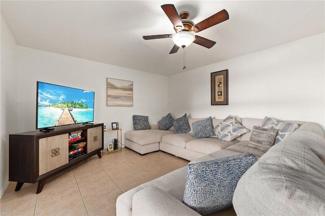 tiled living room featuring ceiling fan