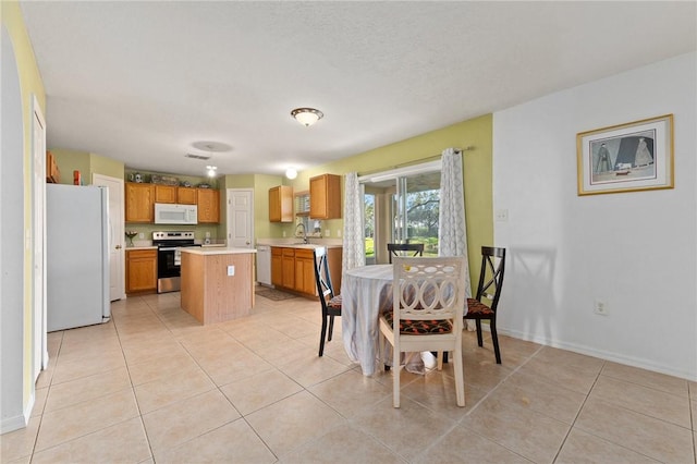 tiled dining space with sink