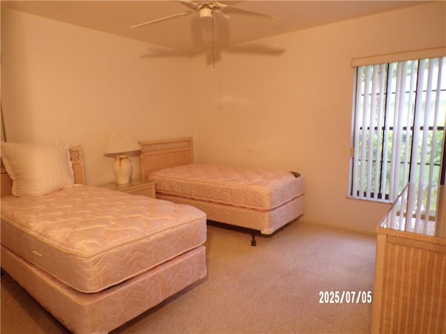 881 48th Ave, Vero Beach, FL 32966 - carpeted bedroom featuring multiple windows and a ceiling fan