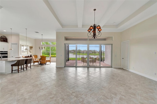 living room featuring beamed ceiling, light tile patterned floors, an inviting chandelier, and plenty of natural light