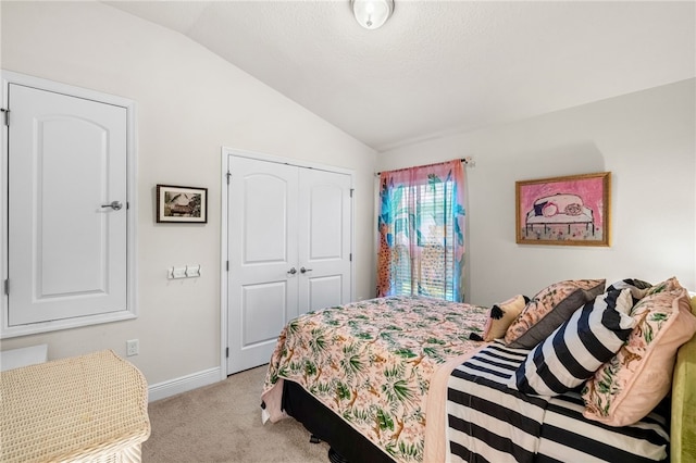 439 Briarcliff Cir, Sebastian, FL 32958 - bedroom with vaulted ceiling, light carpet, a closet, and baseboards