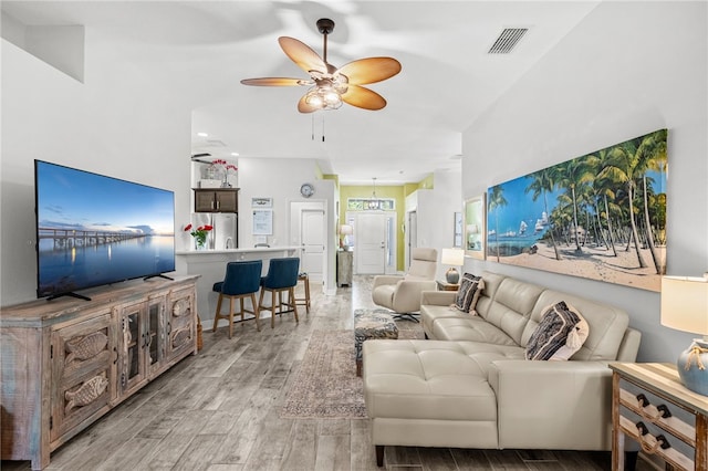 439 Briarcliff Cir, Sebastian, FL 32958 - living room with a ceiling fan, light wood finished floors, and recessed lighting