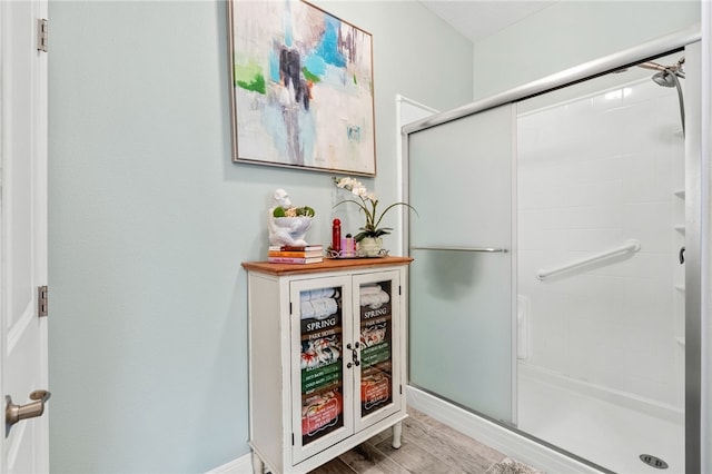 439 Briarcliff Cir, Sebastian, FL 32958 - bathroom with a shower stall and wood finished floors
