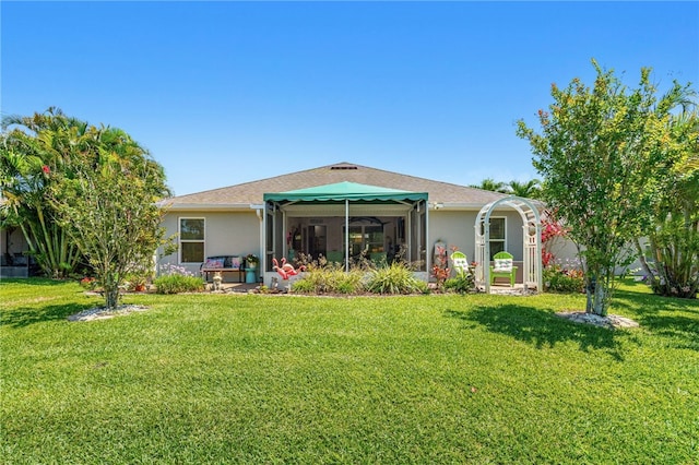 439 Briarcliff Cir, Sebastian, FL 32958 - rear view of house featuring a yard and stucco siding