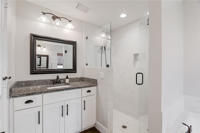 1368 Scroll St, Sebastian, FL 32958 - full bath with a marble finish shower and vanity