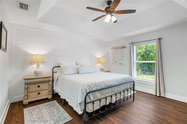1368 Scroll St, Sebastian, FL 32958 - bedroom with a raised ceiling, wood finished floors, and ceiling fan