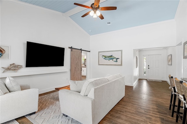 1368 Scroll St, Sebastian, FL 32958 - living room with high vaulted ceiling, a barn door, beam ceiling, a ceiling fan, and wood finished floors